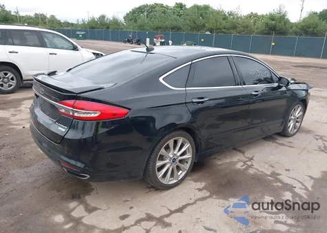 2017 Ford Fusion Platinum z USA, uszkodzony, nr VIN 3FA6P0K98HR103704
